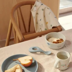 Bavoir à manches Merle Aviator Ecru