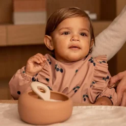 Bavoir à manches Merle Berry