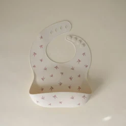 Bavoir à poche en silicone Bows