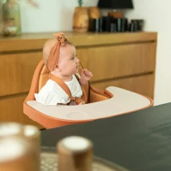 Coussin effet cuir nude pour chaise haute Evolu