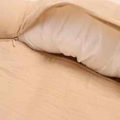 Nid d'ange en mousseline avec peau d'agneau latté