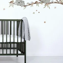 Sticker mural Koalas sur branche avec fleurs (118 x 54 cm)