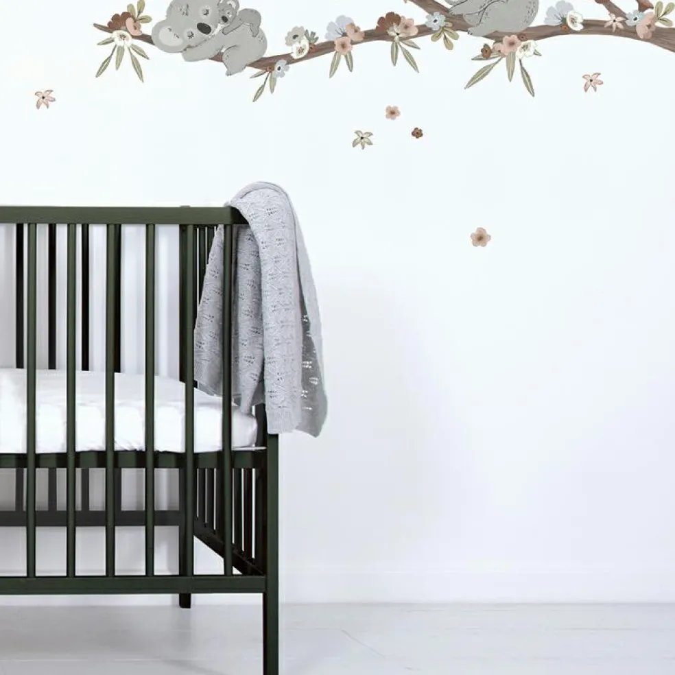 Sticker mural Koalas sur branche avec fleurs (118 x 54 cm)