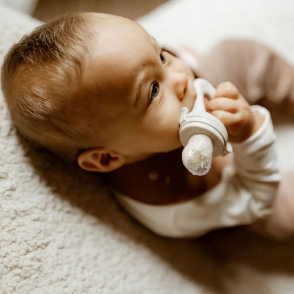 Sucette grignoteuse Sable avec 4 embouts