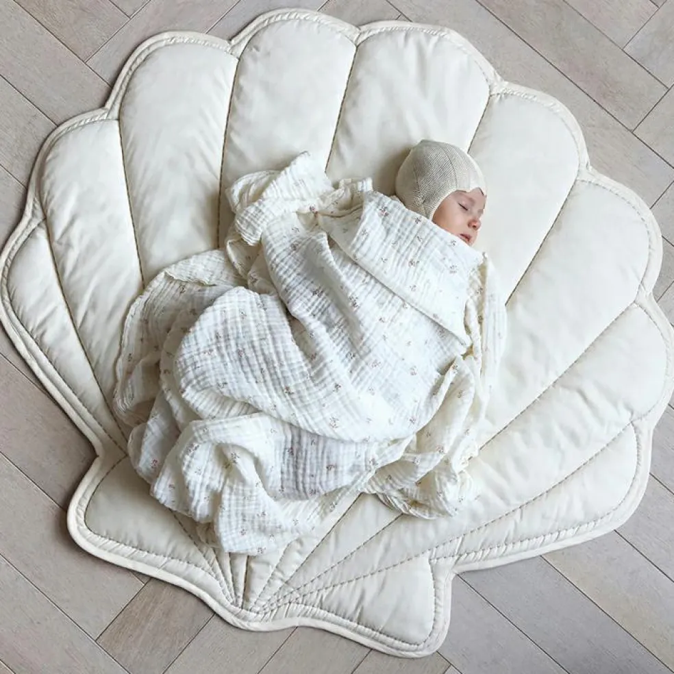 Tapis de jeu coquillage écru