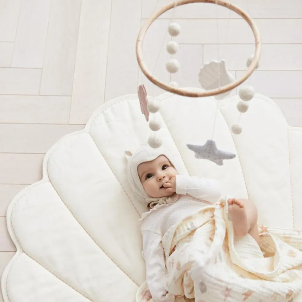 Tapis de jeu coquillage écru