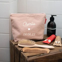 Trousse de toilette rose poudré (personnalisable)